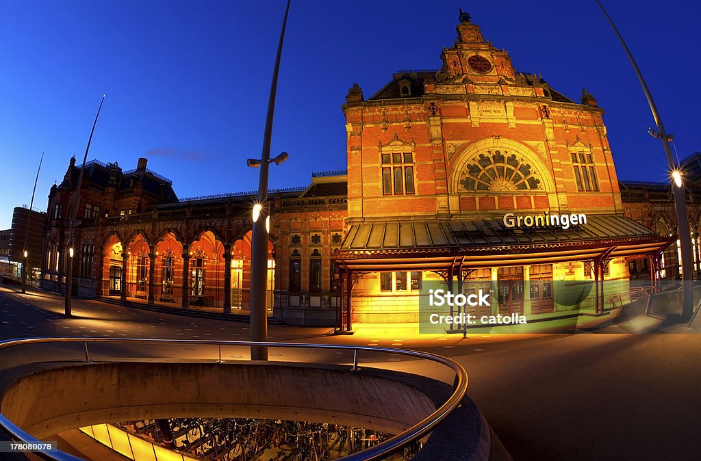 Central Station in Groningen at dusk Central Station and underground bicycle parking in Groningen at dusk Groningen City Stock Photo