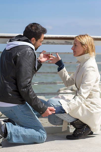 istock Young  couple at Pier with padlock 178080315