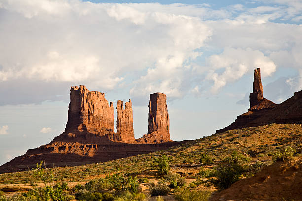 Stagecoach and Bear & Rabbit   are giant sandstone formations Stagecoach and Bear & Rabbit   are giant sandstone formation in the Monument valley david merrick photos stock pictures, royalty-free photos & images