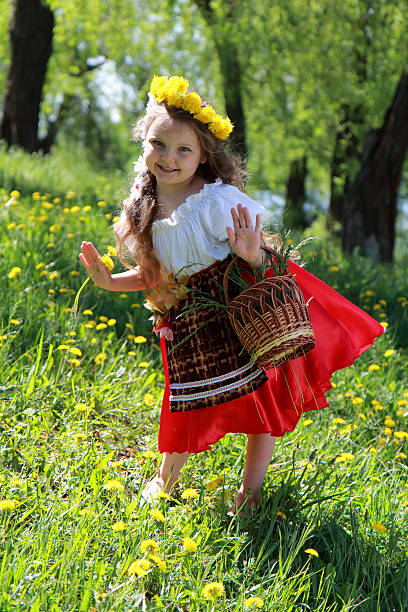 istock Little girl  on grass. 178082265
