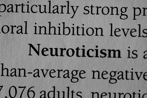 neuroticism, Psychological disorder term printed in black on white paper meaning abnormally sensitive, obsessive, or anxious