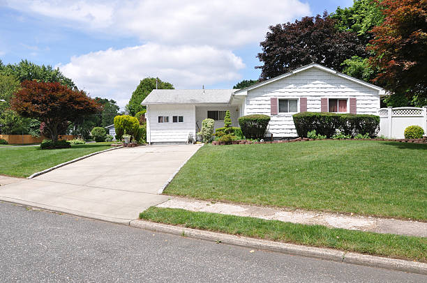 Suburban Back Split Style Ranch Home Front Yard Lawn stock photo