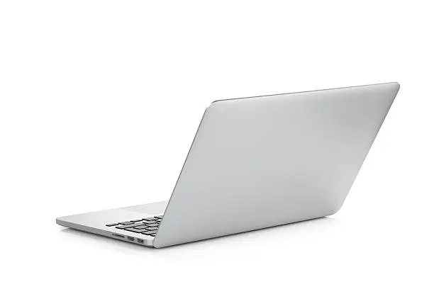 Photo of A laptop open against a white background