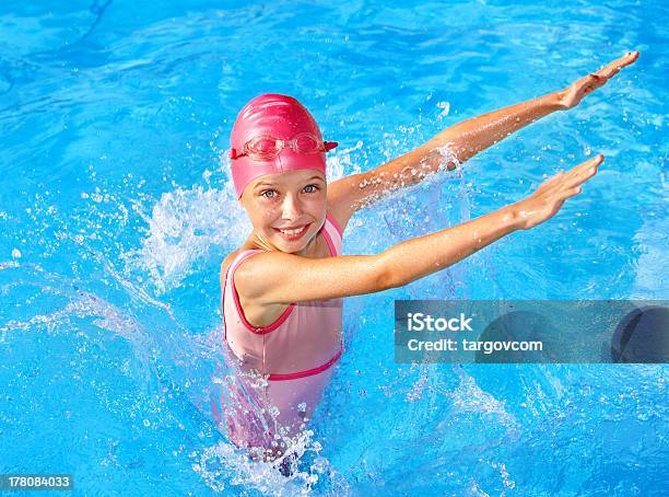 Child Swimming In Pool Stock Photo - Download Image Now - Swimming Pool, Child, Cap - Hat