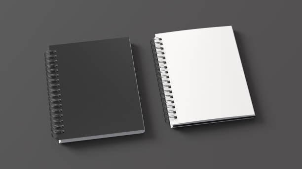 istock Notebook mockup. Closed and open blank notebook with black cover. Spiral notepad on gray background 1780849082