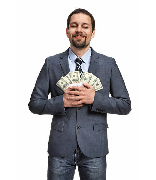 istock Successful businessman holding money 178085691
