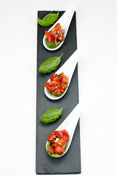 Tomato salad with basil stock photo