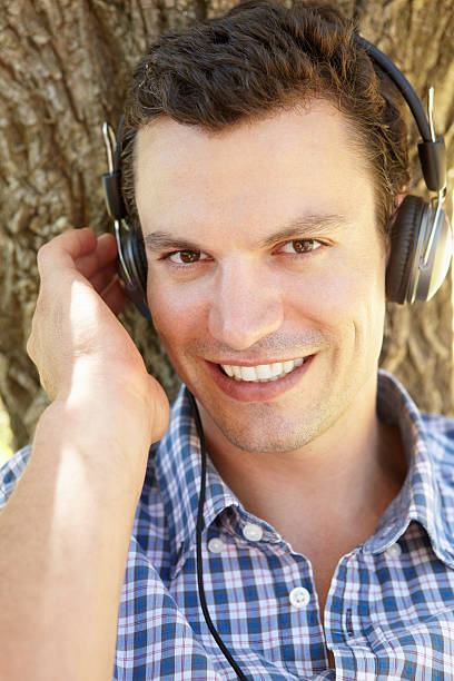 istock Young man listening music 178086049