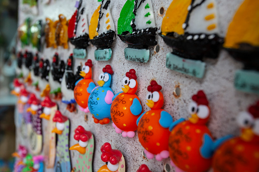 Fridge magnet with image of chickens sold as souvenirs of Porto de Galinhas to tourists