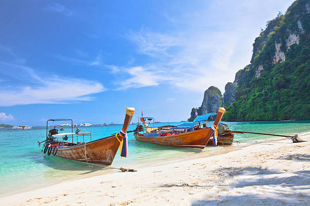 istock Tropical islands with boats 178087571