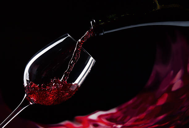 istock bottle and glass with red wine 178087969
