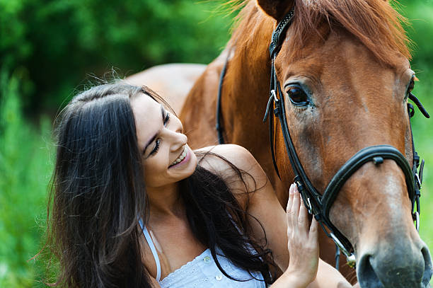 istock woman next horse 178088533