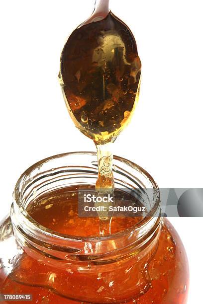 Miel Foto de stock y más banco de imágenes de Alimento - Alimento, Amarillo - Color, Artículos domésticos