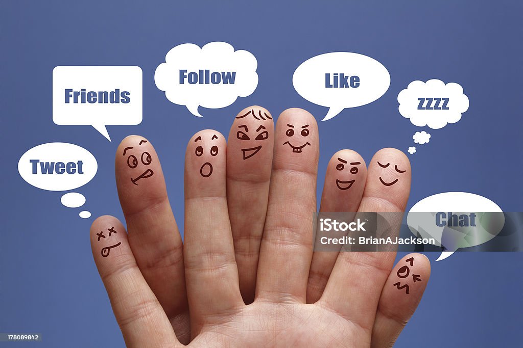 Social media Social network concept finger people in discussion with speech bubbles Humor Stock Photo