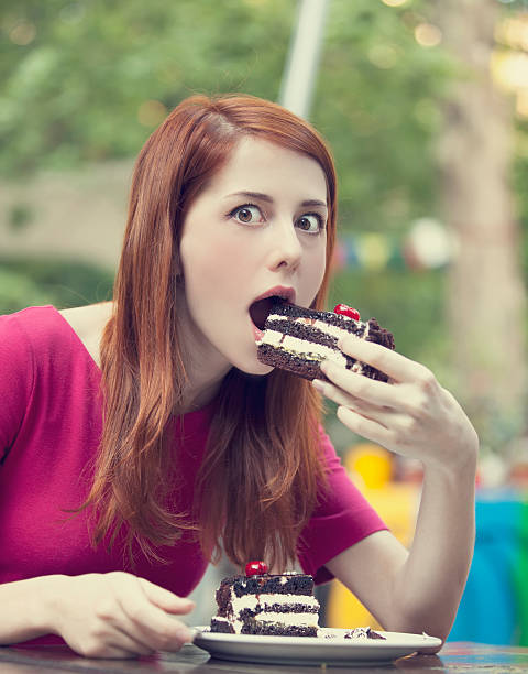 Style redhead girl with cake and cup