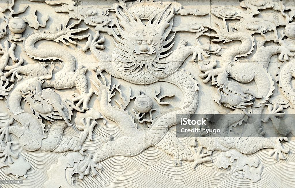 stone Dragons stone Dragons on wall Dragon Stock Photo