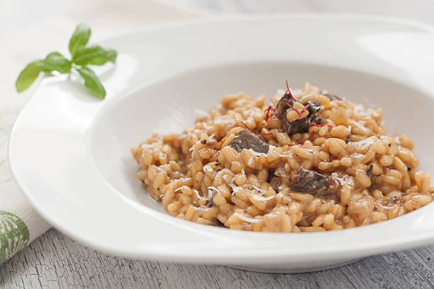 istock Plate full of risotto with mushrooms close-up 178091109