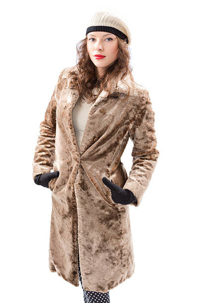istock Beautiful young woman in a coat 178091820
