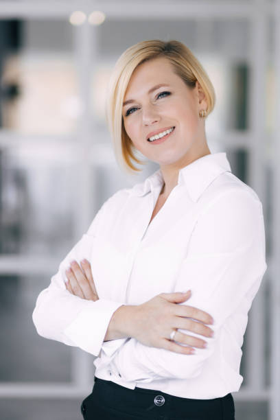 istock Cheerful successful businessman posing against the background of 1780918344
