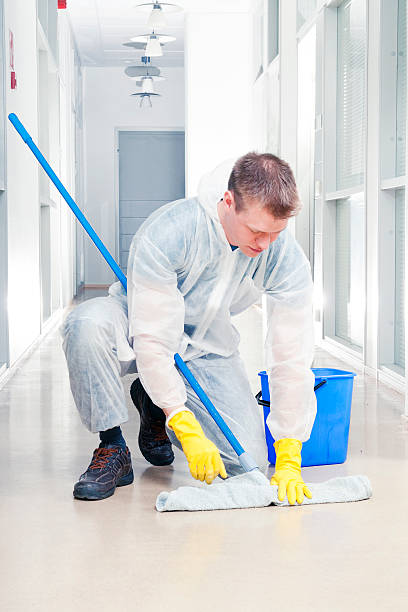 istock Cleaning office wearing protective coveralls 178092253