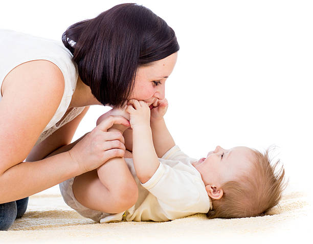 istock happy mother having fun with her baby boy 178092358