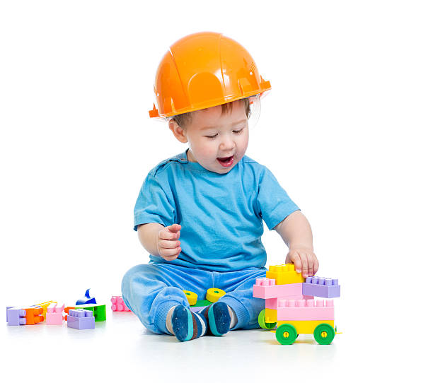 istock kid boy playing with building blocks toy 178093099
