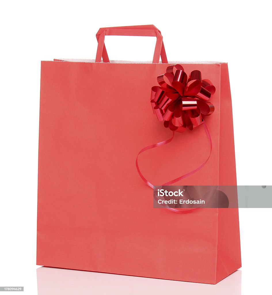 赤い紙のショッピングバッグ、白のリボン - カットアウトのロイヤリティフリーストックフォト