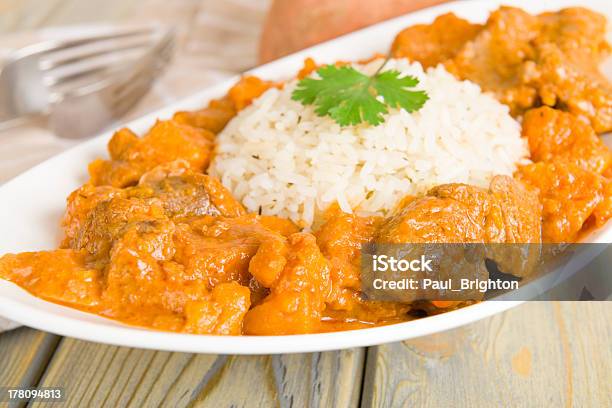 Caribbean Lamb And Sweet Potato Curry Stock Photo - Download Image Now - Peanut - Food, Casserole Dish, Serving Dish