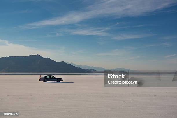 Car Driving On Salt Flats Stock Photo - Download Image Now - Bonneville Salt Flats, Agility, Arid Climate