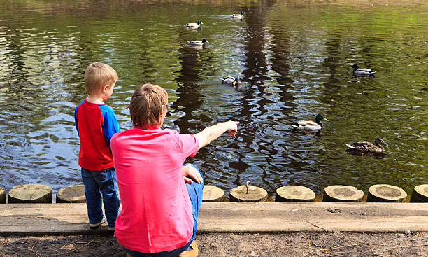 istock father and son in the park 178095075