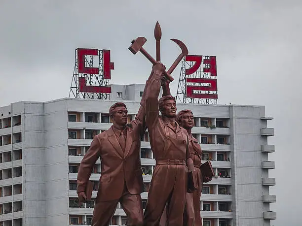 Pyongyang, North Korea - July, 2011: A typical communist style statue in the capital city of North Korea.
