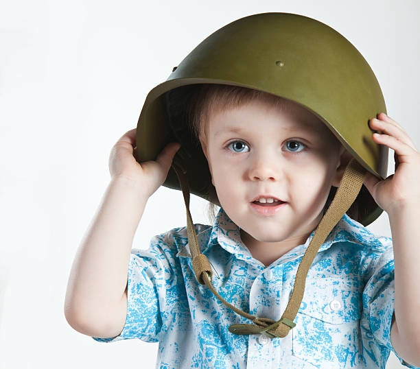 istock Boy with army helmet isolated on white 178095434