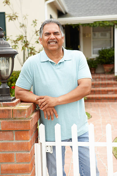 istock Senior Hispanic man outside home 178098551