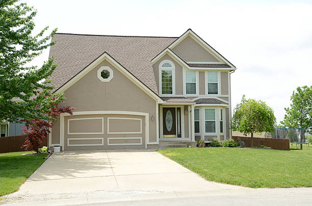 modern two story house with stucco