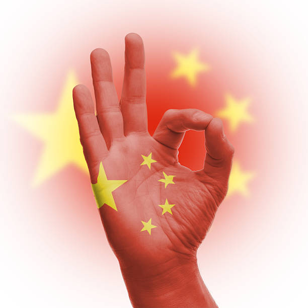 hand OK sign, wrapped in the flag of China