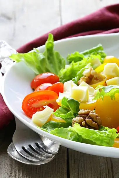 snack salad with cheese and walnuts