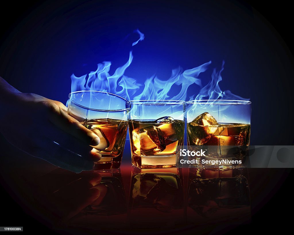 Three glasses of burning yellow absinthe Image of three glasses of burning yellow absinthe Absinthe Stock Photo