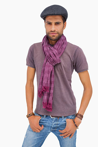 istock Serious man wearing peaked cap and scarf 178100497