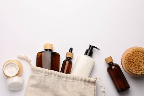 istock Preparation for spa. Compact toiletry bag and cosmetic products on white background, flat lay. Space for text 1781006947