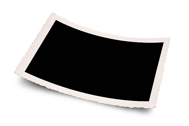 Old photo with curled edges (XXXL) Antique picture frame with curled corners and soft shadows, isolated on white with clipping path. Perfect for your design work. curve photos stock pictures, royalty-free photos & images