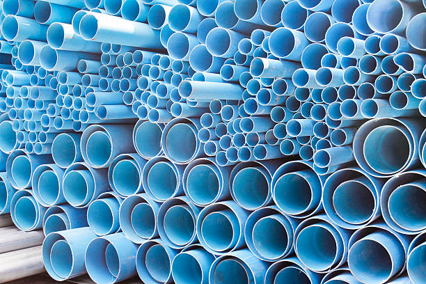 istock PVC pipes stacked in construction site 178101407