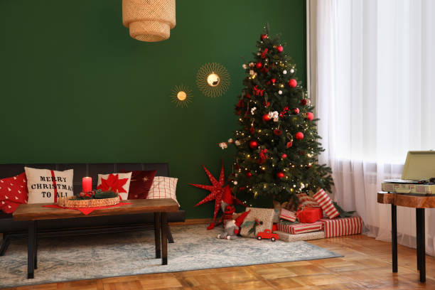istock Cozy living room with Christmas tree and festive decor. Interior design 1781014584