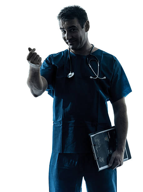 istock doctor man silhouette portrait gesturing money 178102930