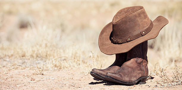 istock brown cowboy hat and boots outdoor 178104884