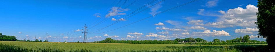 Electricity Pylons and blue sky. The photo was taken in Lower Austria.