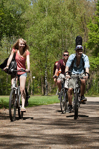 istock Teenagers riding on bicycles 178107218