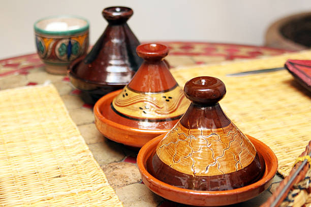 istock Different ceramic tajines with food on the table 178107517