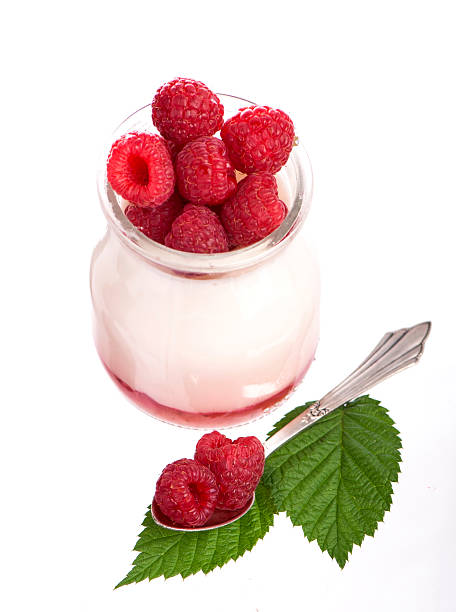 istock Fresh Yogurt in a jar with Raspberries, leaves 178109617
