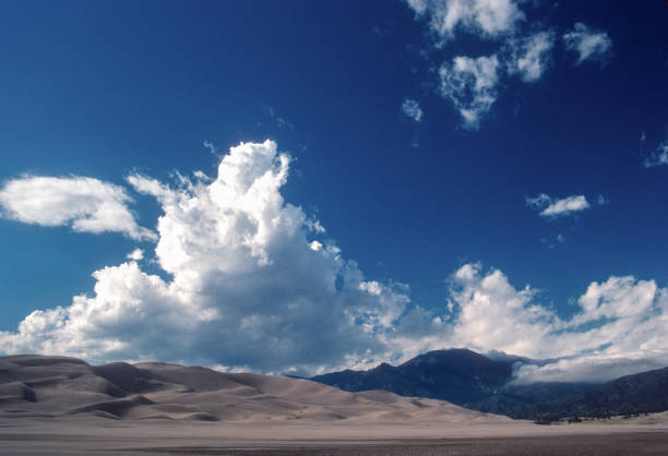 istock Great Sand Dunes NP - Clouds Tower Above Dunes - 1990 1781096541