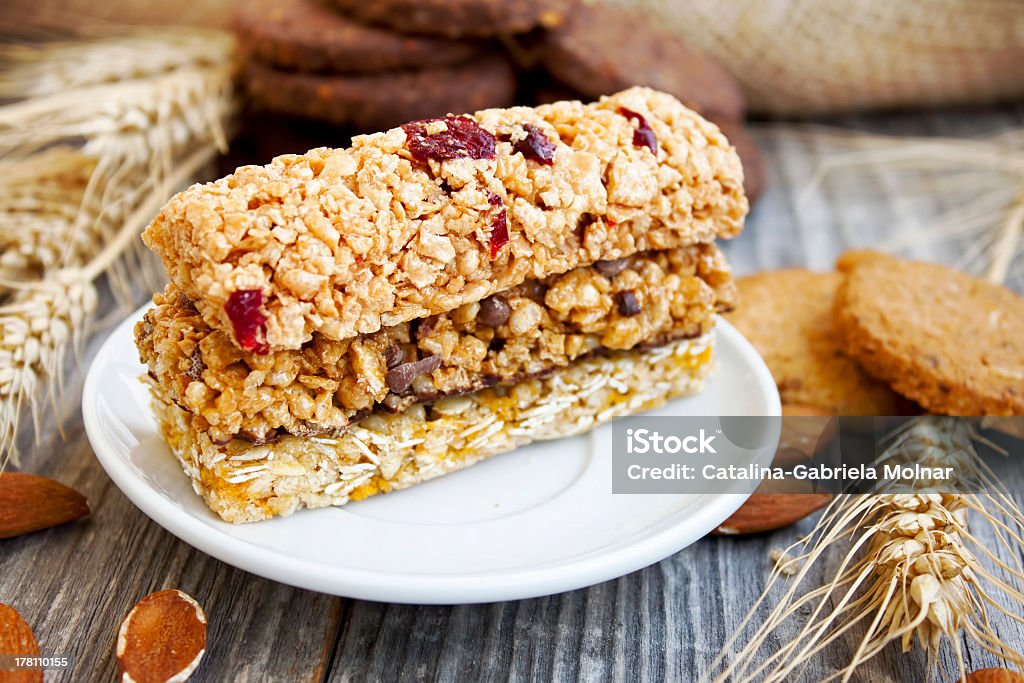 Muesli bars granola and muesli bars, sweet breakfast with almonds and grain biscuits Almond Stock Photo